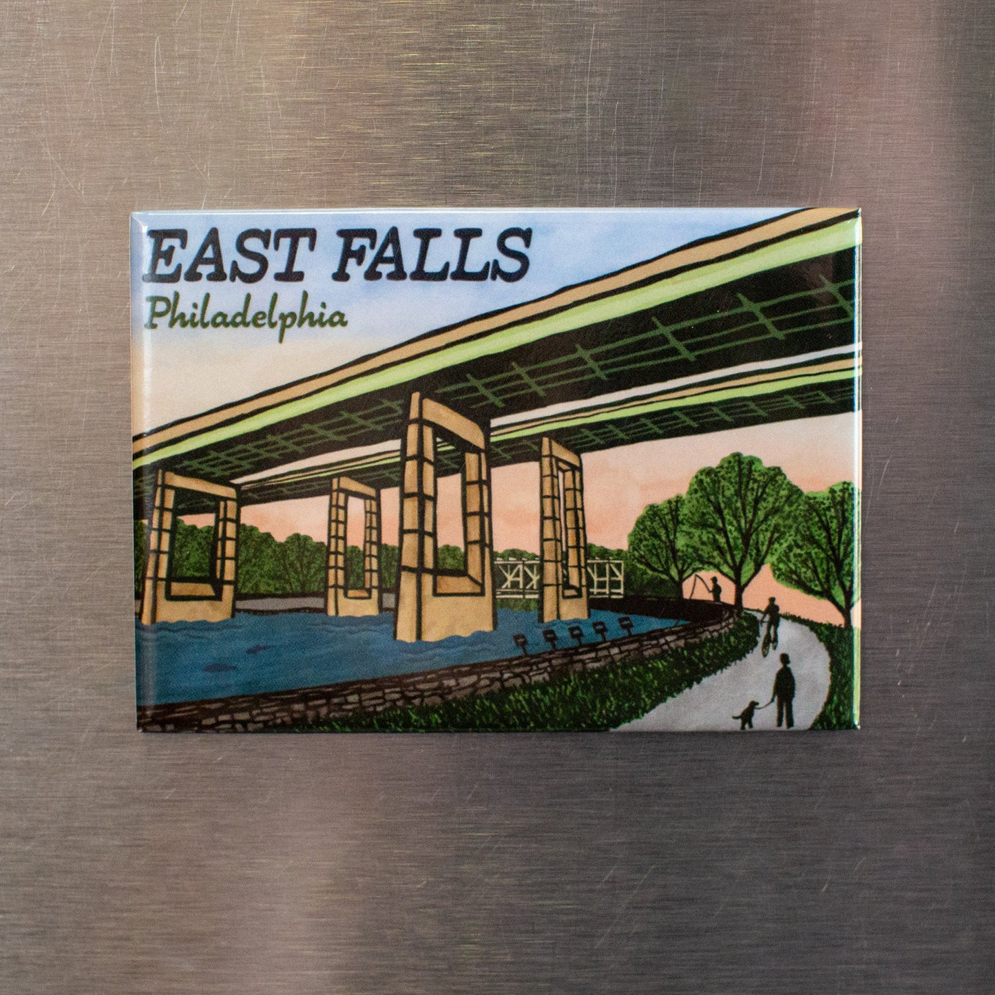 Fridge magnet with 'East Falls Twin Bridges Philadelphia' design on a metallic surface