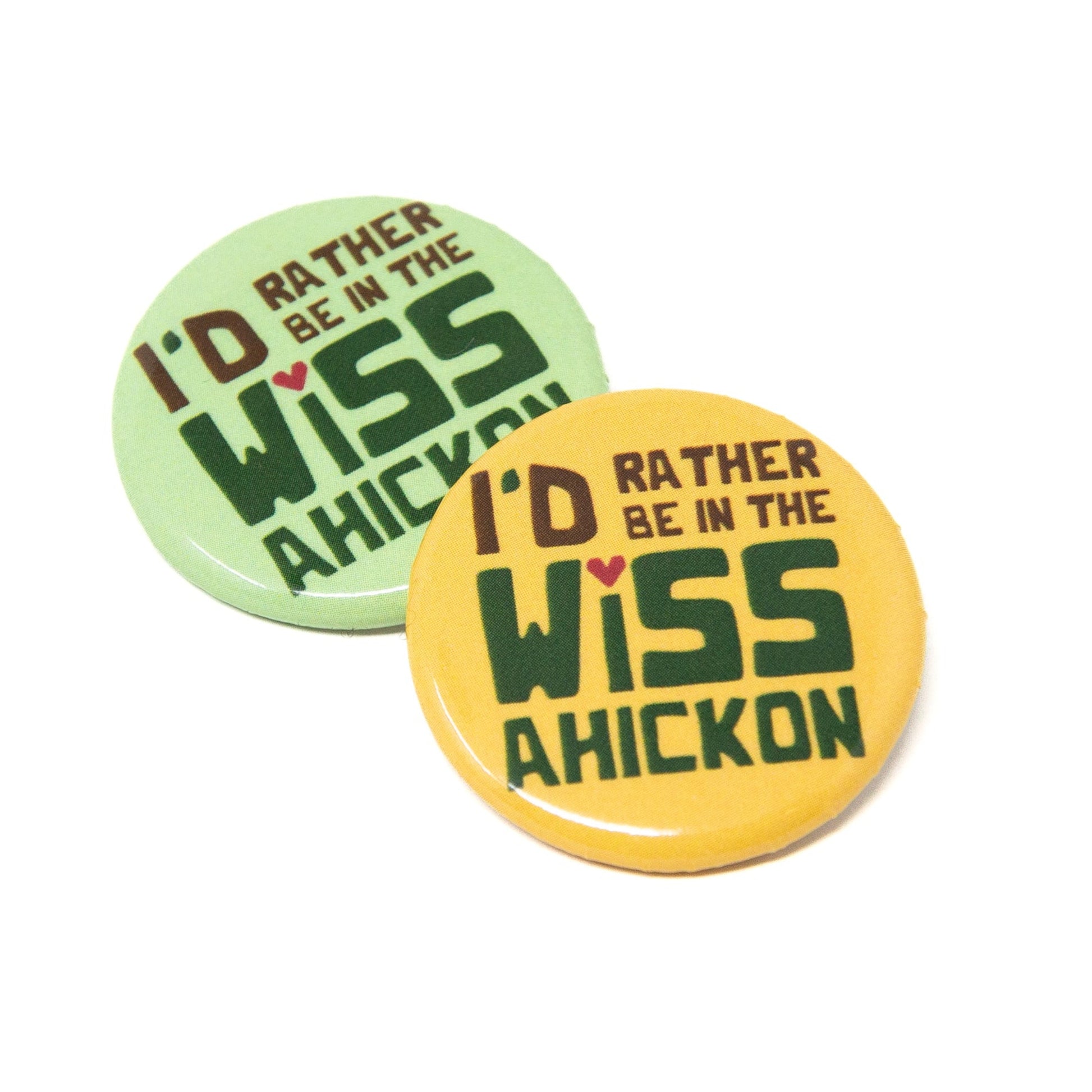 Yellow and green button with 'I'd Rather be in the Wissahickon' text on a white background.