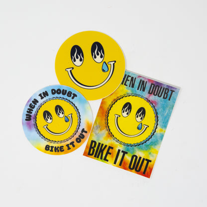 Set of three stickers with smiley faces and motivational text on a white background.