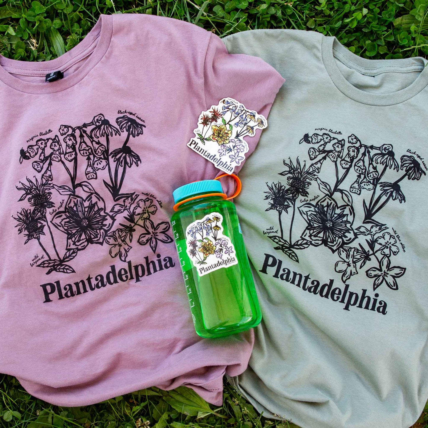 Two t-shirts, magnet, and sticker with 'Plantadelphia' branding