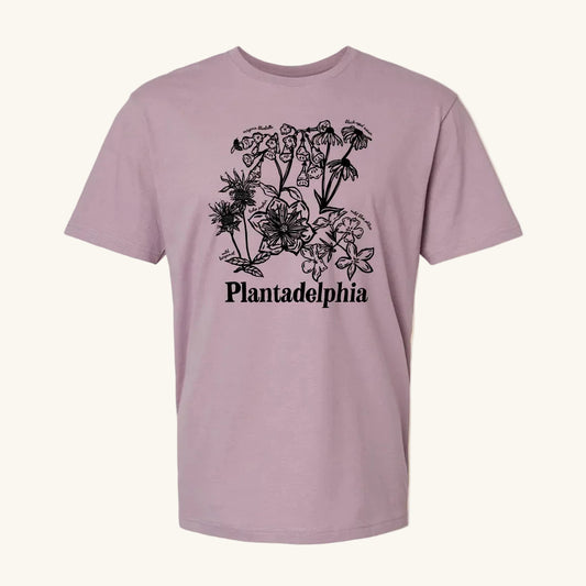 Purple t-shirt with black floral design and 'Plantadelphia' text on a yellow background