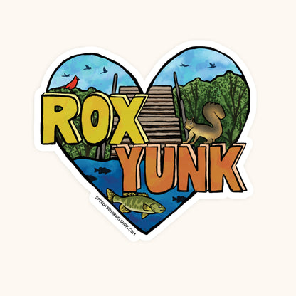 Heart-shaped sticker with 'ROX YUNK' text and nature-themed illustrations on a white background