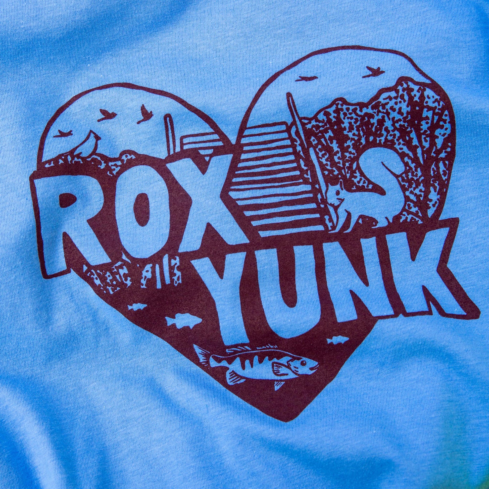 Blue t-shirt with 'RoxYunk' heart graphic 