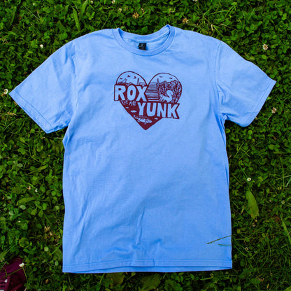 Heart-shaped design with 'ROX YUNK' text on a blue t-shirt
