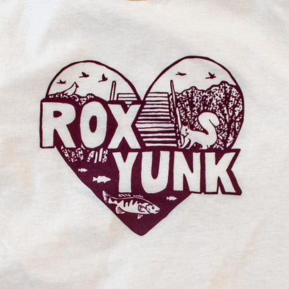Heart-shaped design with 'ROX YUNK' text on a cream t-shirt