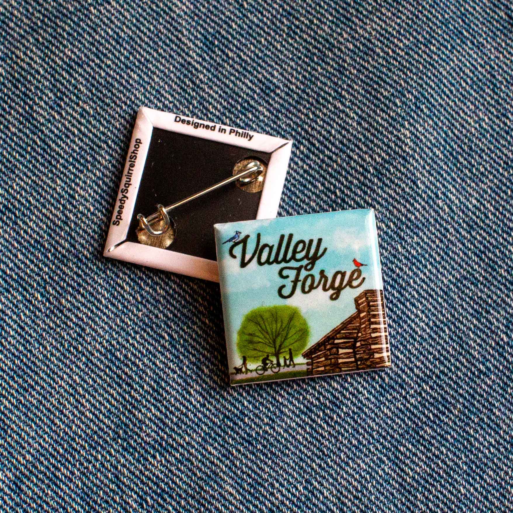 Valley Forge pin on a denim background