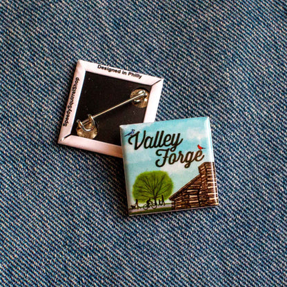 Valley Forge pin on a denim background