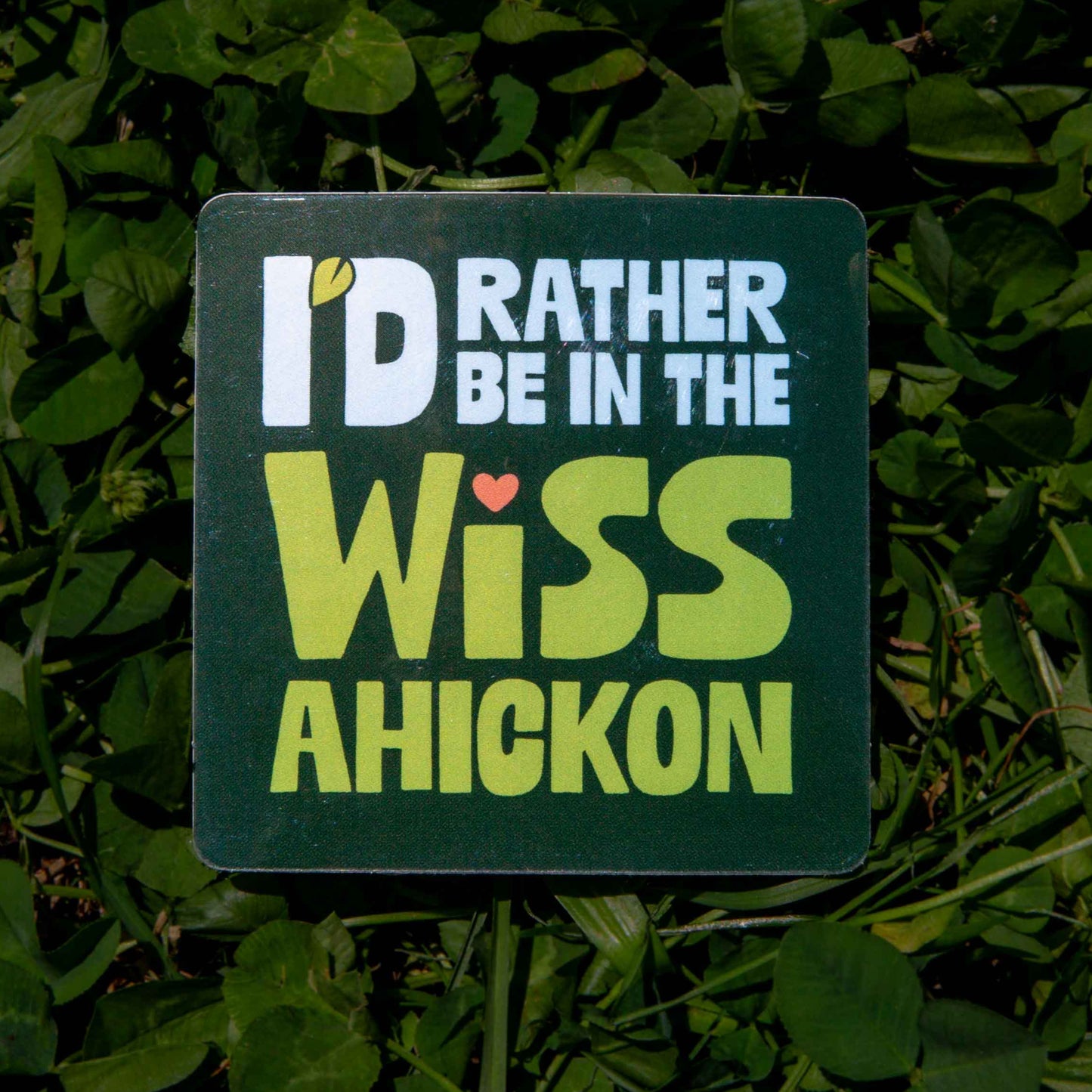 Sticker with text 'I'd Rather Be in the Wissahickon' on a green background with retro font